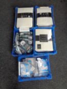 Five plastic crates containing triple blade razors and nose clips (new),