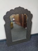 A Moroccan style wall mirror.