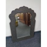 A Moroccan style wall mirror.