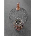 An Eastern style wire metal bird cage.