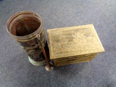 A brass embossed stick pot together with a brass embossed coal box