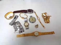 A box containing a collection of assorted ladies and gents wristwatches,