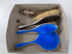 A box of silver and tortoise shell dressing table brush, silver pepper pot,