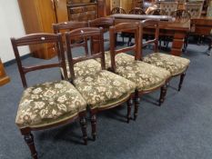 A set of six late 19th century mahogany dining chairs upholstered in a green brocade fabric
