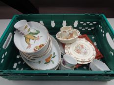 A box containing Royal Worcester Evesham china and Royal Doulton Bunnykins china.