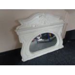 A white painted plaster overmantel mirror.