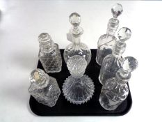 A tray containing seven 20th century glass decanters.