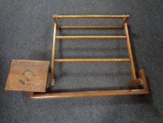 A 20th century towel rail together with a fire curb and an oak foot stool.
