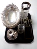 A tray of 20th century plated wares to include swing handled basket, candlestick, toast rack,