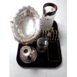 A tray of 20th century plated wares to include swing handled basket, candlestick, toast rack,