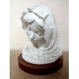 A Lladro figure 'Small bust with vale' 1539 (as found) CONDITION REPORT: Numerous