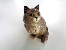 A Beswick figure of a cat,