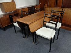 A six piece mid 20th century teak G-Plan dining room suite comprising of low sideboard,