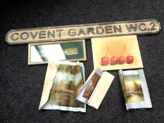 A wooden Covent Garden street sign together with a box containing unframed oil on canvas of