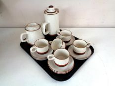 A tray of thirteen piece Denby Pottery coffee service