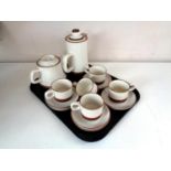 A tray of thirteen piece Denby Pottery coffee service