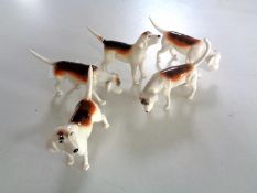 Five Beswick beagle figures