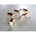 Five Beswick beagle figures