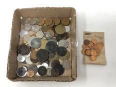 A box of coins to include uncirculated half pennies, commemorative FA Cup coins,