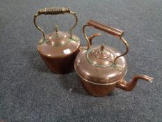 Two antique copper kettles, one with brass handle.