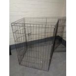 A folding metal dog pen