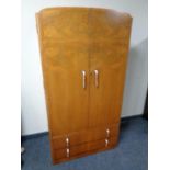 A 1930's walnut gentleman's wardrobe