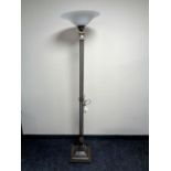 An Art Deco style floor lamp with opaque glass shade