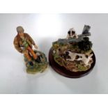 A Border Fine Arts figure of Shepherd with sheep dog by Ray Ayres and a similar figure depicting