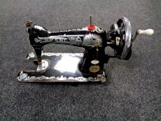 A vintage Grand sewing machine.