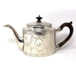 A George III silver teapot, William Plummer, London 1781, bearing initials 'G J C', height 14cm.