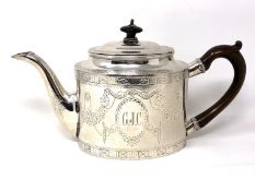 A George III silver teapot, William Plummer, London 1781, bearing initials 'G J C', height 14cm.