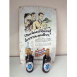 A tin Newcastle Brown Ale advertisement sign together with two bottles of Newcastle Brown Ale Alan