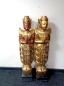 A pair of giltwood floor standing figures of Temple Guardians, 114cm high.