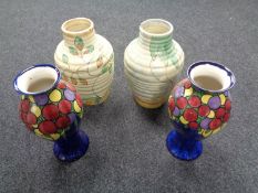 A pair of Kensington pottery ribbed vases together with a further pair of Barker Brothers vases