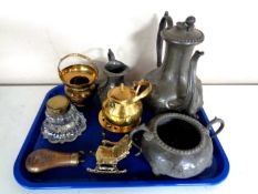 A tray containing antique and later metal wares to include a three piece pewter embossed tea