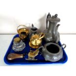 A tray containing antique and later metal wares to include a three piece pewter embossed tea