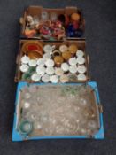 Three boxes containing miscellaneous china and glassware.