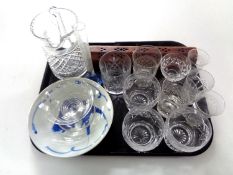 A tray containing assorted antique and later drinking glasses, cut glass water jug,