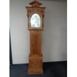 A carved pine cased Tempus Fugit grandfather clock.