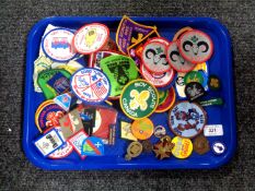 A tray of a large quantity of sew on patches relating to scouting together with a gold plated fob,