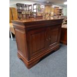 An Ernest Menard double door sideboard fitted two drawers