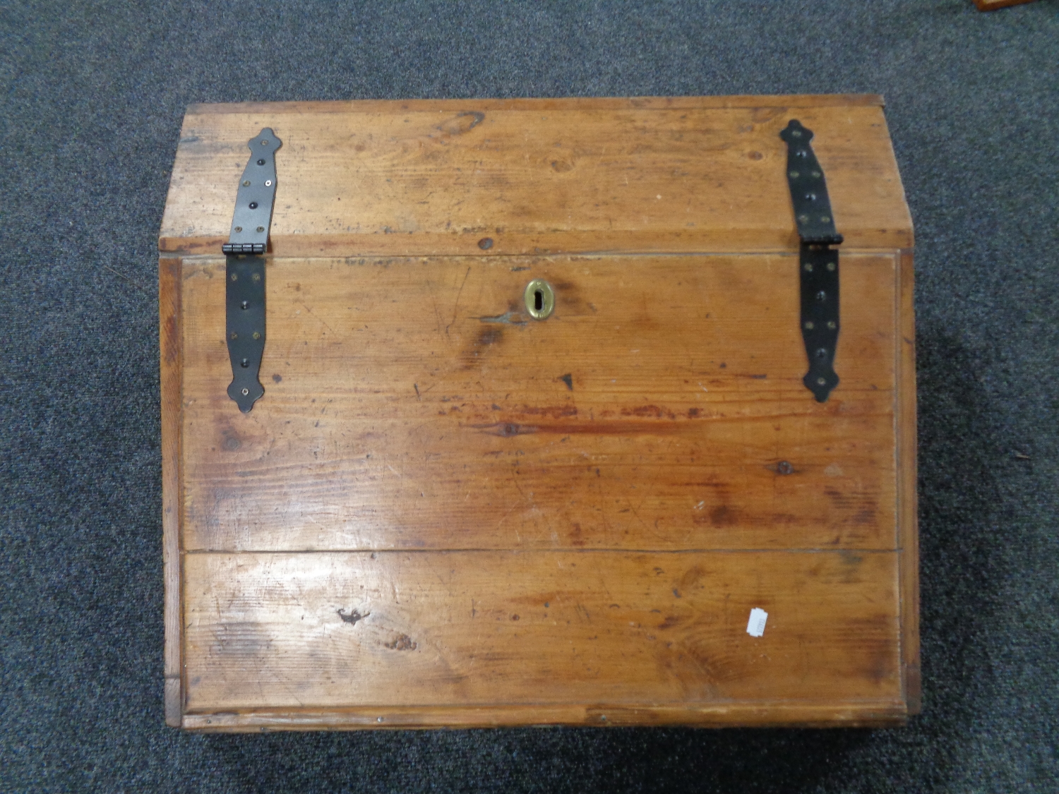 An antique pine clerk's slope fitted three internal drawers