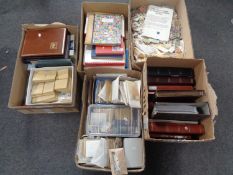 Five boxes of a large quantity of stamps in albums and folders,