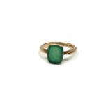 A 9ct gold intaglio ring set with a green stone, size M. CONDITION REPORT: 1.