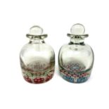 Two antique glass scent bottles with millefiore base decoration, height 14 cm.