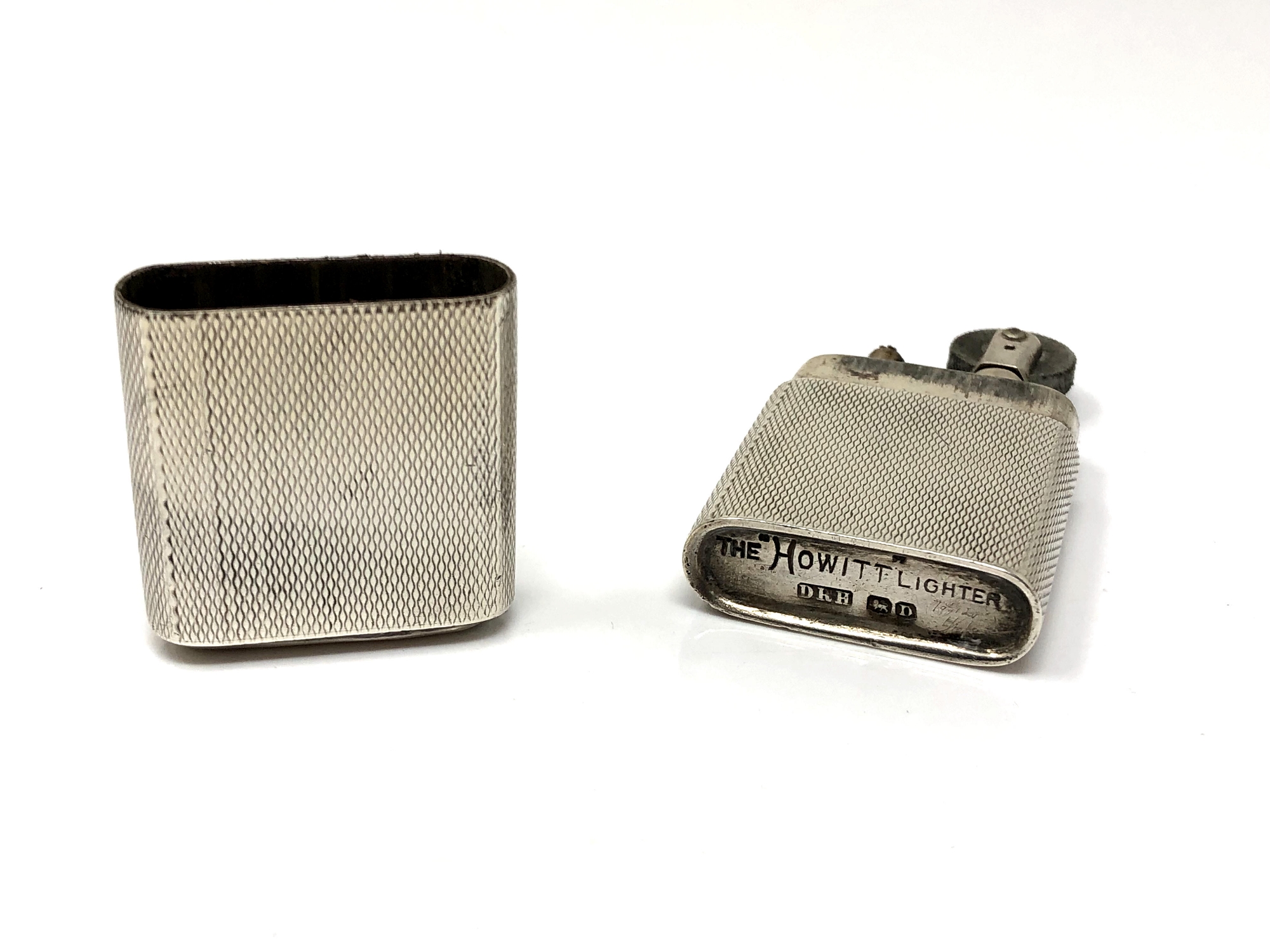 A silver 'The Howitt Lighter' with engine turned decoration, Sheffield 1946. - Image 2 of 2