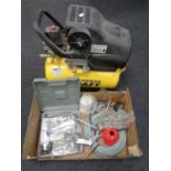 A Powercraft compressor together with a box containing a large quantity of compressor accessories.