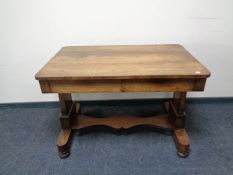 A 19th century rosewood library table fitted two drawers