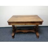 A 19th century rosewood library table fitted two drawers