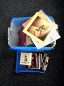 A box and a crate containing a large quantity of vinyl LPs and 45 singles to include Buddy Holly,